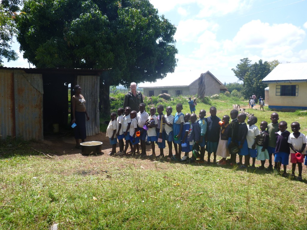 Infants queuing for breakfast - porridge